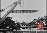 Image of ship hull pieces flattened for recycling into cars Dearborn Michigan USA, 1928, second 22 stock footage video 65675078285