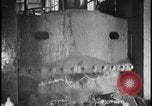 Image of ship hull pieces flattened for recycling into cars Dearborn Michigan USA, 1928, second 50 stock footage video 65675078285