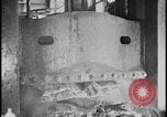 Image of ship hull pieces flattened for recycling into cars Dearborn Michigan USA, 1928, second 52 stock footage video 65675078285