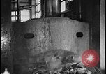 Image of ship hull pieces flattened for recycling into cars Dearborn Michigan USA, 1928, second 54 stock footage video 65675078285