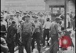 Standbild Ford workers jam pedestrian bridges and roadways Dearborn Michigan USA, 1928, aus Sekunde 51 historischem Filmmaterial Videoclip 65675078295