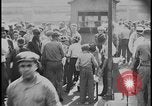 Standbild Ford workers jam pedestrian bridges and roadways Dearborn Michigan USA, 1928, aus Sekunde 53 historischem Filmmaterial Videoclip 65675078295