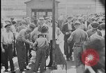 Standbild Ford workers jam pedestrian bridges and roadways Dearborn Michigan USA, 1928, aus Sekunde 56 historischem Filmmaterial Videoclip 65675078295
