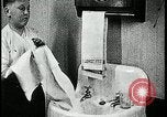 Image of boy washing face Kansas City Missouri USA, 1922, second 55 stock footage video 65675078310