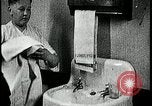 Image of boy washing face Kansas City Missouri USA, 1922, second 56 stock footage video 65675078310