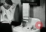Image of boy washing face Kansas City Missouri USA, 1922, second 59 stock footage video 65675078310