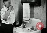 Image of boy washing face Kansas City Missouri USA, 1922, second 61 stock footage video 65675078310