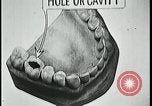 Image of woman with apron clearing plates Kansas City Missouri USA, 1922, second 13 stock footage video 65675078311
