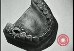 Image of woman with apron clearing plates Kansas City Missouri USA, 1922, second 15 stock footage video 65675078311
