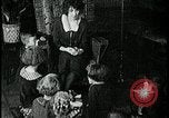 Image of woman with apron clearing plates Kansas City Missouri USA, 1922, second 23 stock footage video 65675078311