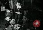 Image of woman with apron clearing plates Kansas City Missouri USA, 1922, second 24 stock footage video 65675078311