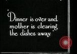 Image of woman with apron clearing plates Kansas City Missouri USA, 1922, second 26 stock footage video 65675078311