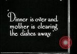 Image of woman with apron clearing plates Kansas City Missouri USA, 1922, second 29 stock footage video 65675078311