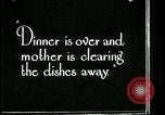 Image of woman with apron clearing plates Kansas City Missouri USA, 1922, second 31 stock footage video 65675078311