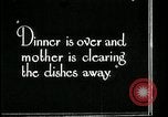Image of woman with apron clearing plates Kansas City Missouri USA, 1922, second 32 stock footage video 65675078311