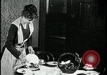Image of woman with apron clearing plates Kansas City Missouri USA, 1922, second 38 stock footage video 65675078311