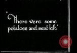 Image of woman with apron clearing plates Kansas City Missouri USA, 1922, second 41 stock footage video 65675078311