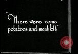 Image of woman with apron clearing plates Kansas City Missouri USA, 1922, second 43 stock footage video 65675078311