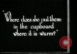 Image of woman with apron clearing plates Kansas City Missouri USA, 1922, second 57 stock footage video 65675078311
