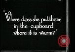 Image of woman with apron clearing plates Kansas City Missouri USA, 1922, second 59 stock footage video 65675078311