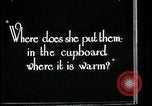 Image of woman with apron clearing plates Kansas City Missouri USA, 1922, second 62 stock footage video 65675078311
