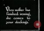 Image of woman darning stockings Kansas City Missouri USA, 1922, second 8 stock footage video 65675078312
