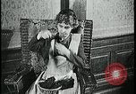 Image of woman darning stockings Kansas City Missouri USA, 1922, second 28 stock footage video 65675078312
