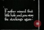 Image of woman darning stockings Kansas City Missouri USA, 1922, second 34 stock footage video 65675078312