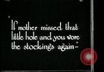 Image of woman darning stockings Kansas City Missouri USA, 1922, second 35 stock footage video 65675078312