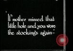 Image of woman darning stockings Kansas City Missouri USA, 1922, second 38 stock footage video 65675078312
