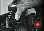 Image of woman darning stockings Kansas City Missouri USA, 1922, second 39 stock footage video 65675078312