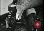 Image of woman darning stockings Kansas City Missouri USA, 1922, second 40 stock footage video 65675078312