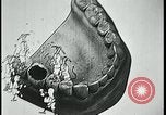 Image of woman darning stockings Kansas City Missouri USA, 1922, second 58 stock footage video 65675078312