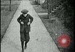 Image of boy walking Kansas City Missouri USA, 1922, second 5 stock footage video 65675078315