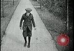 Image of boy walking Kansas City Missouri USA, 1922, second 7 stock footage video 65675078315