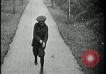 Image of boy walking Kansas City Missouri USA, 1922, second 9 stock footage video 65675078315