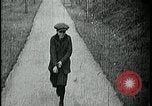 Image of boy walking Kansas City Missouri USA, 1922, second 10 stock footage video 65675078315