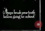 Image of brushing teeth Kansas City Missouri USA, 1922, second 5 stock footage video 65675078316