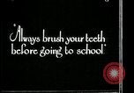Image of brushing teeth Kansas City Missouri USA, 1922, second 7 stock footage video 65675078316