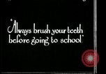 Image of brushing teeth Kansas City Missouri USA, 1922, second 8 stock footage video 65675078316