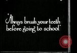 Image of brushing teeth Kansas City Missouri USA, 1922, second 9 stock footage video 65675078316