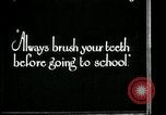 Image of brushing teeth Kansas City Missouri USA, 1922, second 10 stock footage video 65675078316