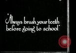 Image of brushing teeth Kansas City Missouri USA, 1922, second 11 stock footage video 65675078316
