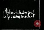 Image of brushing teeth Kansas City Missouri USA, 1922, second 12 stock footage video 65675078316