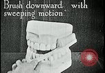 Image of brushing teeth Kansas City Missouri USA, 1922, second 19 stock footage video 65675078316