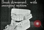Image of brushing teeth Kansas City Missouri USA, 1922, second 20 stock footage video 65675078316