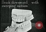 Image of brushing teeth Kansas City Missouri USA, 1922, second 22 stock footage video 65675078316