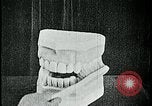 Image of brushing teeth Kansas City Missouri USA, 1922, second 23 stock footage video 65675078316