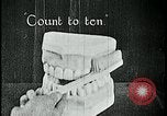 Image of brushing teeth Kansas City Missouri USA, 1922, second 27 stock footage video 65675078316