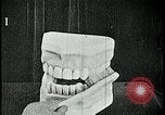 Image of brushing teeth Kansas City Missouri USA, 1922, second 28 stock footage video 65675078316